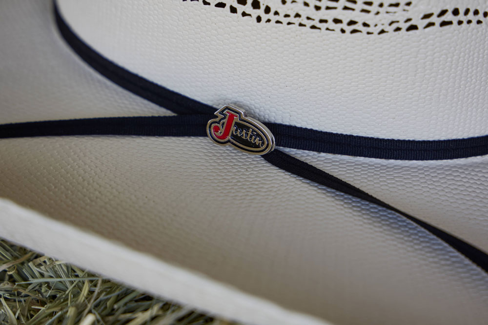 A close up of a Justin Straw cowboy hat.